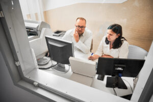 Two IT specialists sitting at computers