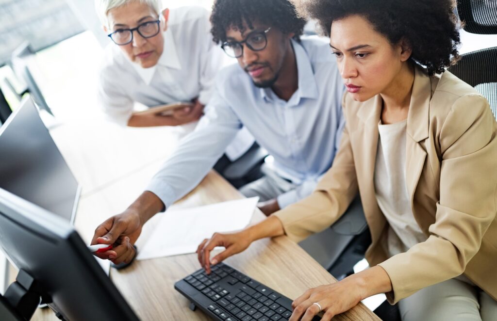 bank employees discussing segregation of duties